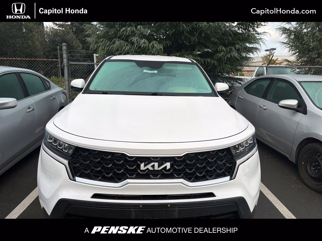 Used 2023 White Pearl Kia LX image 1