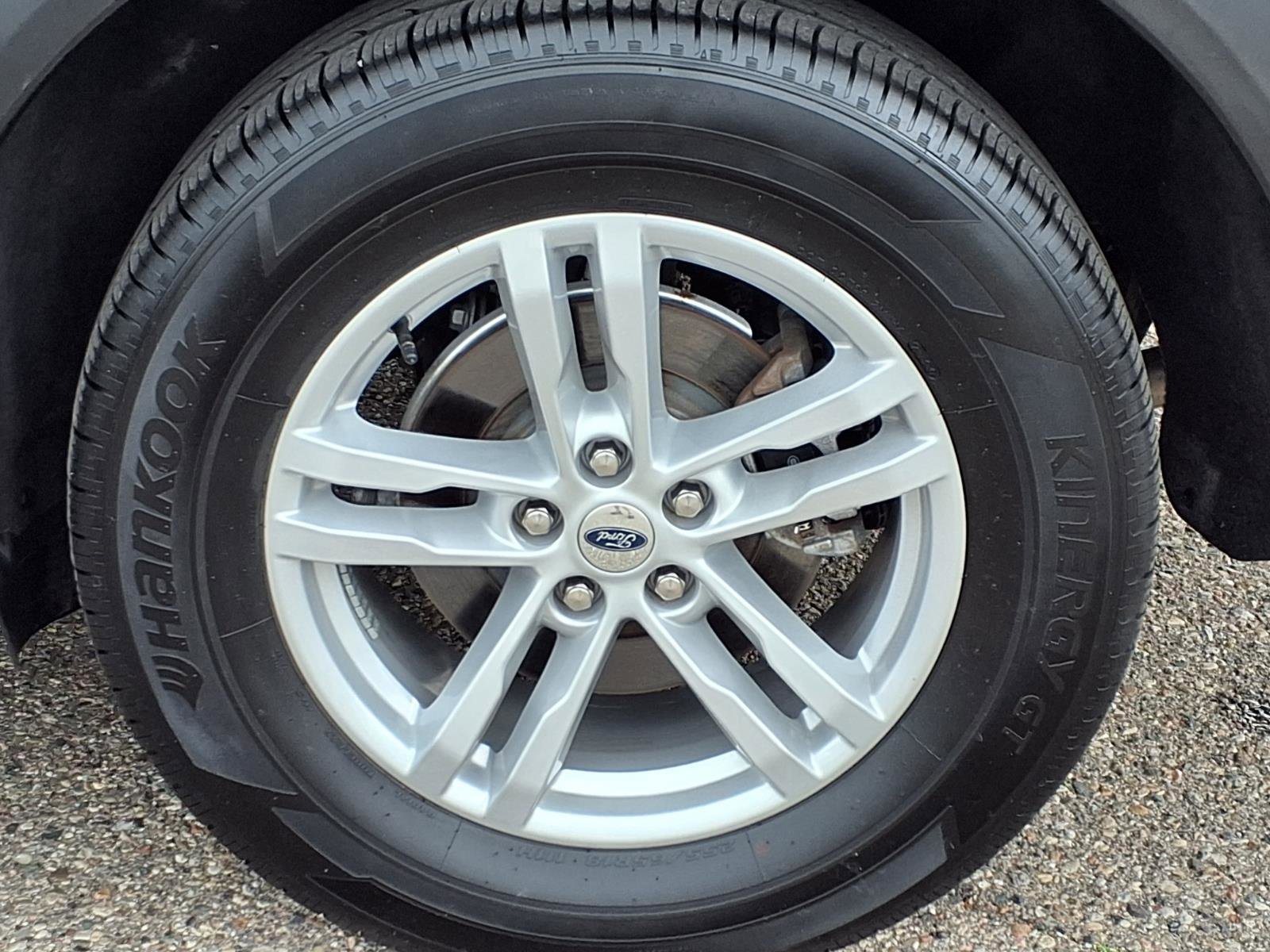 Certified Used 2024 Agate Black Metallic Ford XLT image 30