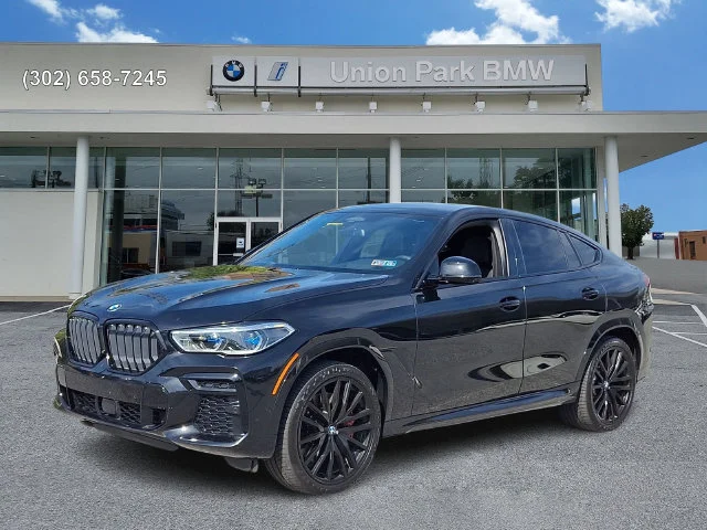 Used 2022 Black Sapphire Metallic BMW M50i image 1