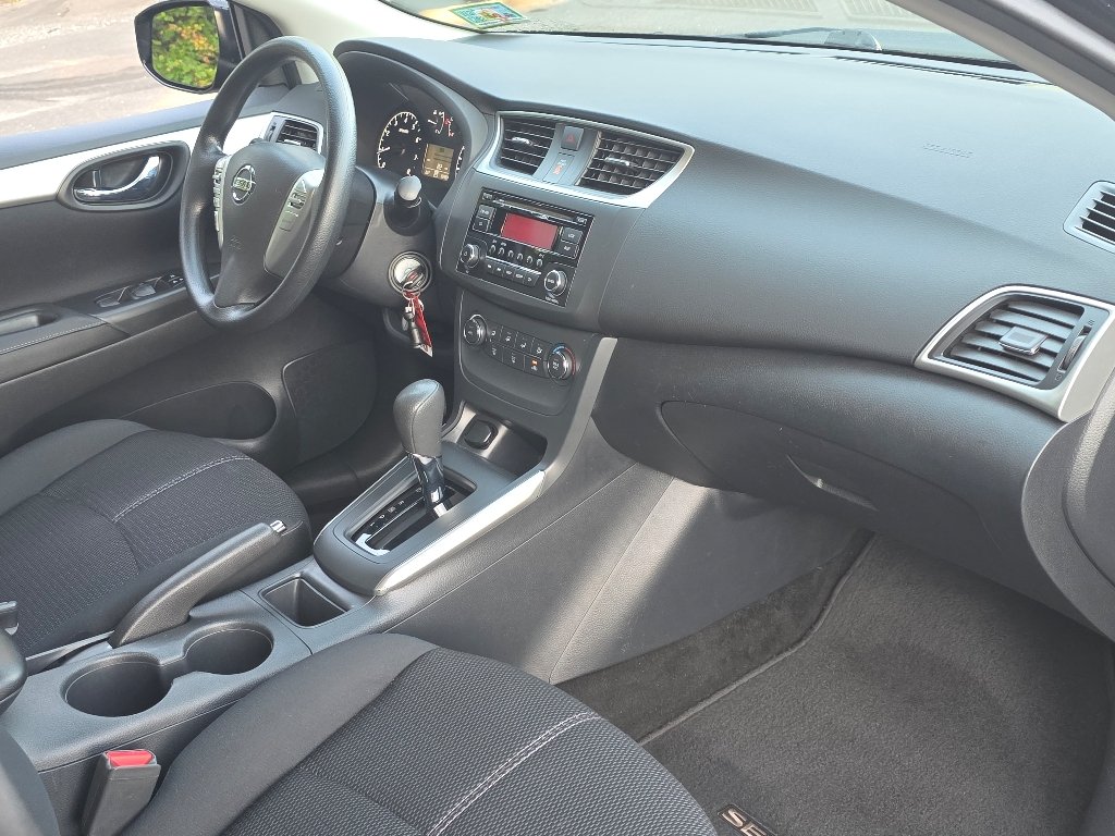 Used 2016 Super Black Nissan S image 16