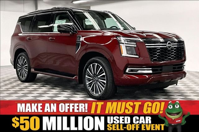 New 2026 Coulis Red Pearl/Super Black Nissan Platinum Reserve image 1