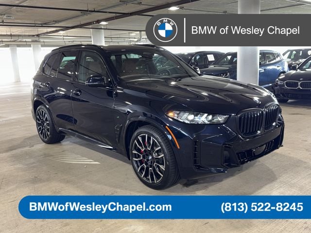 New 2026 Carbon Black Metallic BMW xDrive50e image 1