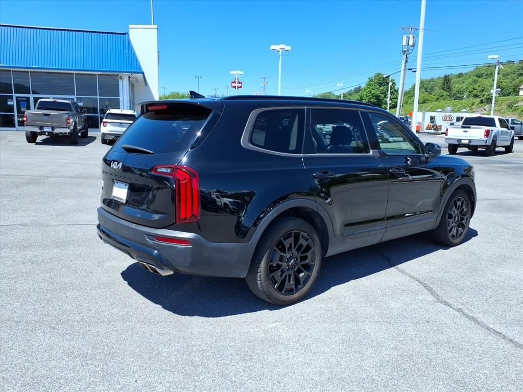 Used 2022 Ebony Black Kia EX image 12