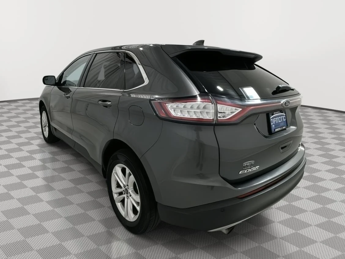 Used 2018 Magnetic Metallic Ford SEL image 3