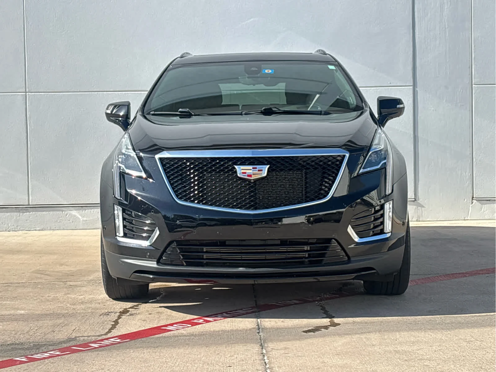 Used 2024 Stellar Black Metallic Cadillac Sport image 2