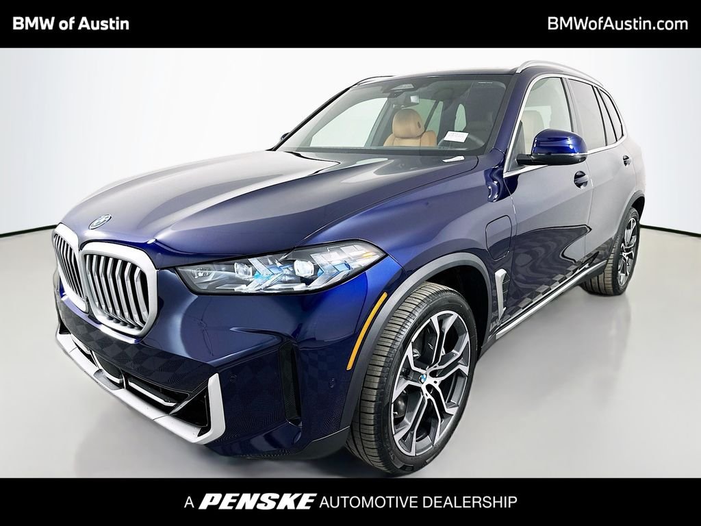 New 2026 Tanzanite Blue II Metallic BMW xDrive50e image 1