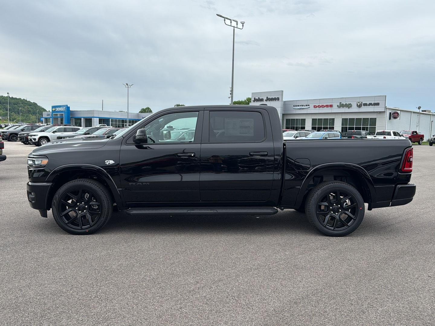 New 2026 Diamond Black Crystal Pearl-Coat Exterior Paint RAM Laramie image 7