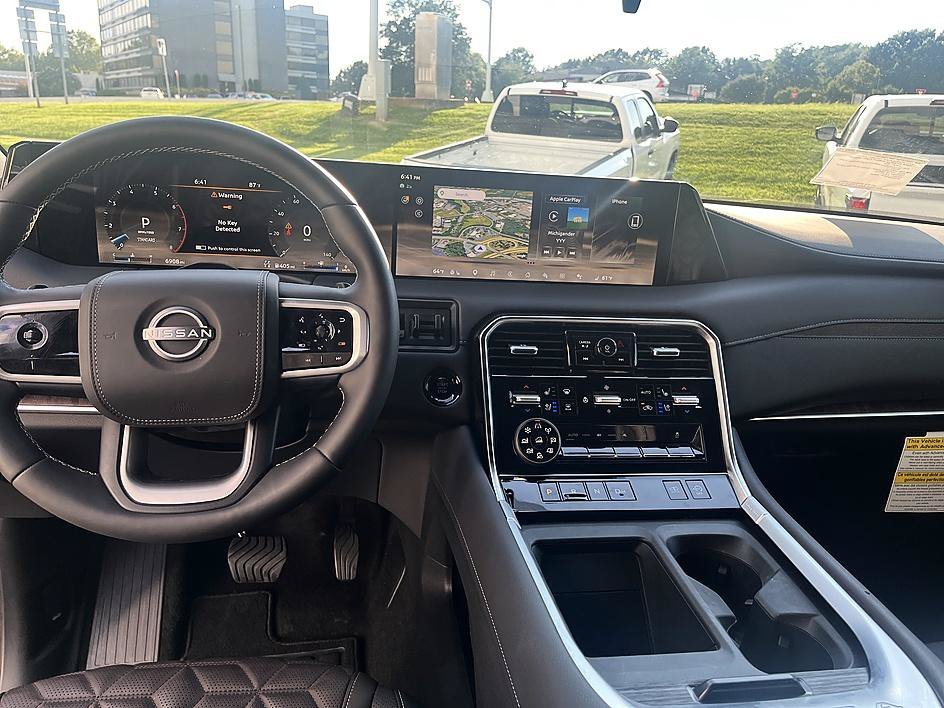 Used 2025 Super Black Nissan Platinum Reserve image 14
