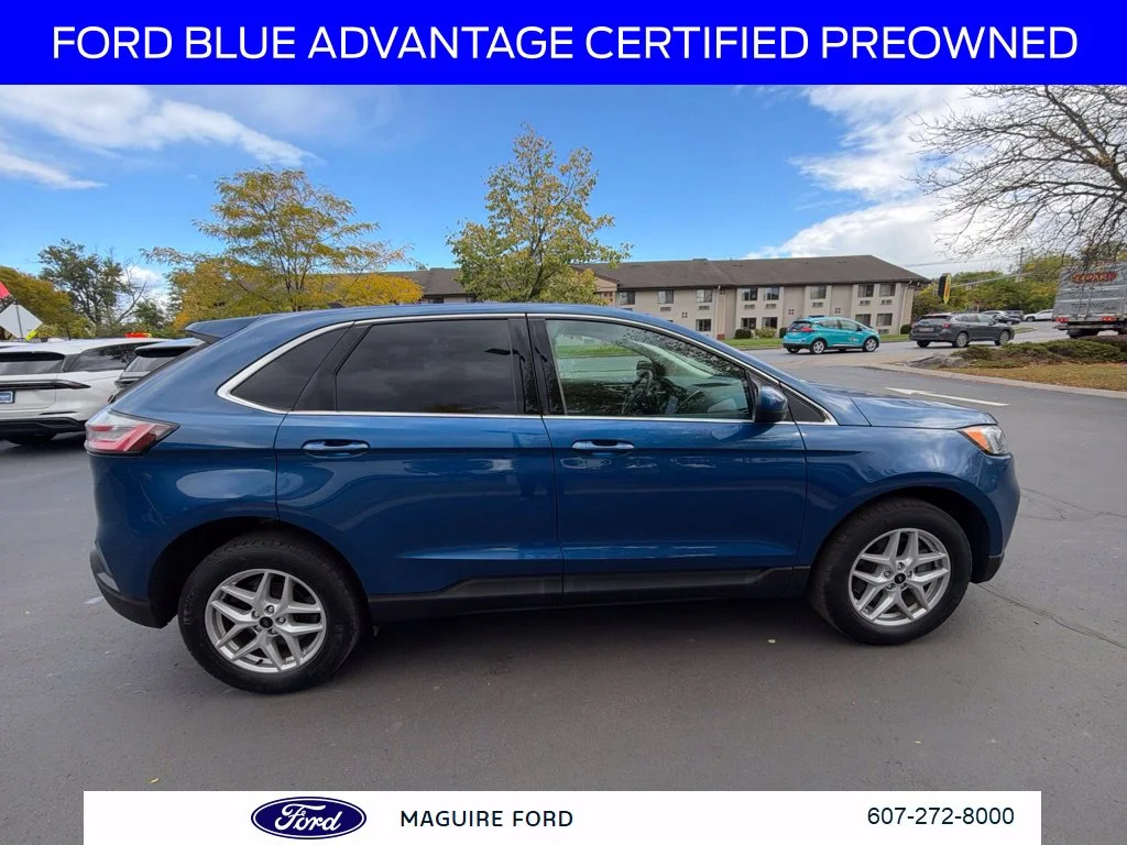 Used 2024 Blue Metallic Ford SEL image 4