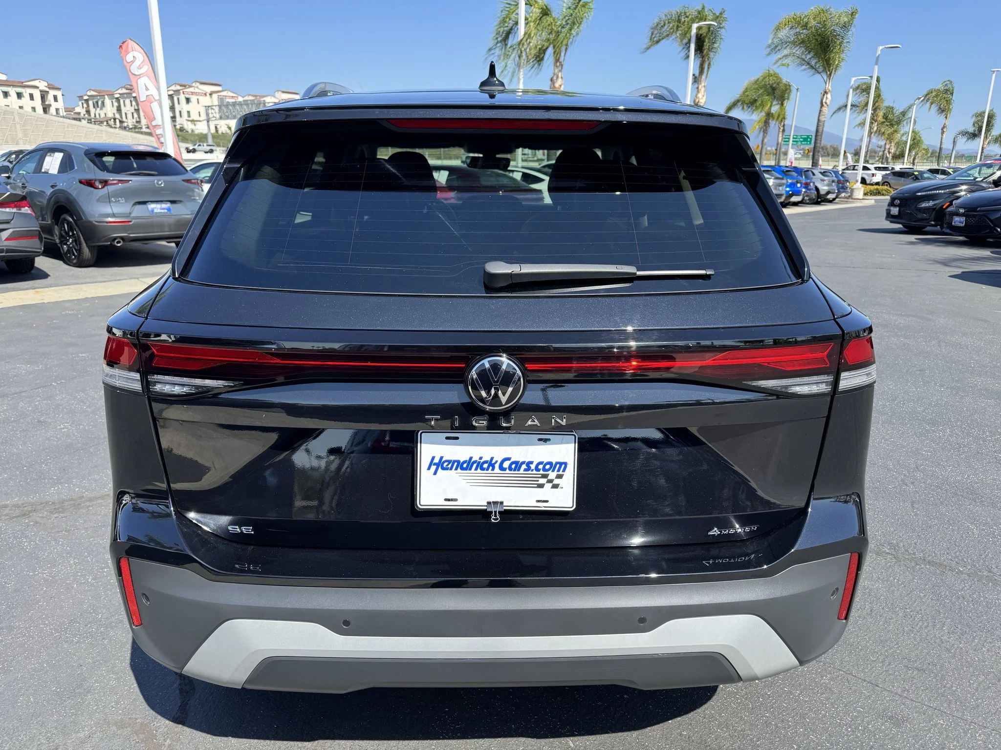 Used 2025 Deep Black Pearl Volkswagen SE w/Sunroof 4Motion image 8