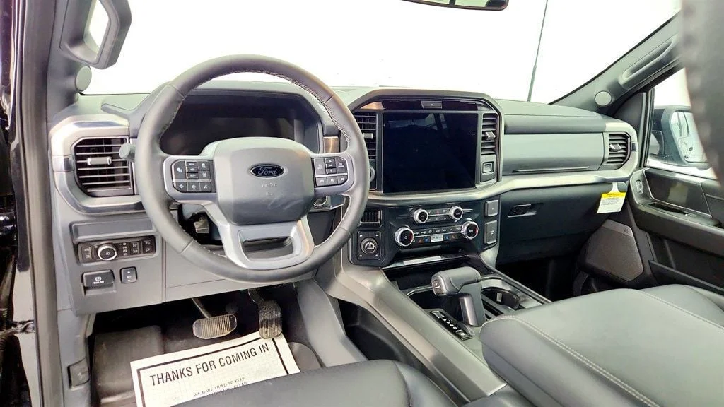 Used 2025 Agate Black Metallic Ford LARIAT 4WD SuperCrew 5.5