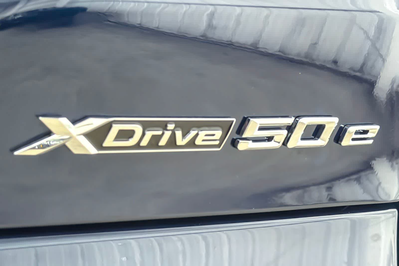 New 2026 Tanzanite Blue II Metallic BMW xDrive50e image 26