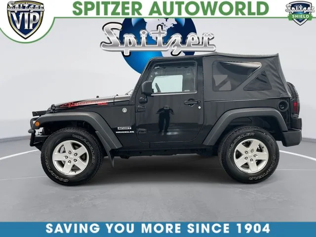 Used 2013 Black Clearcoat Jeep Sport image 7