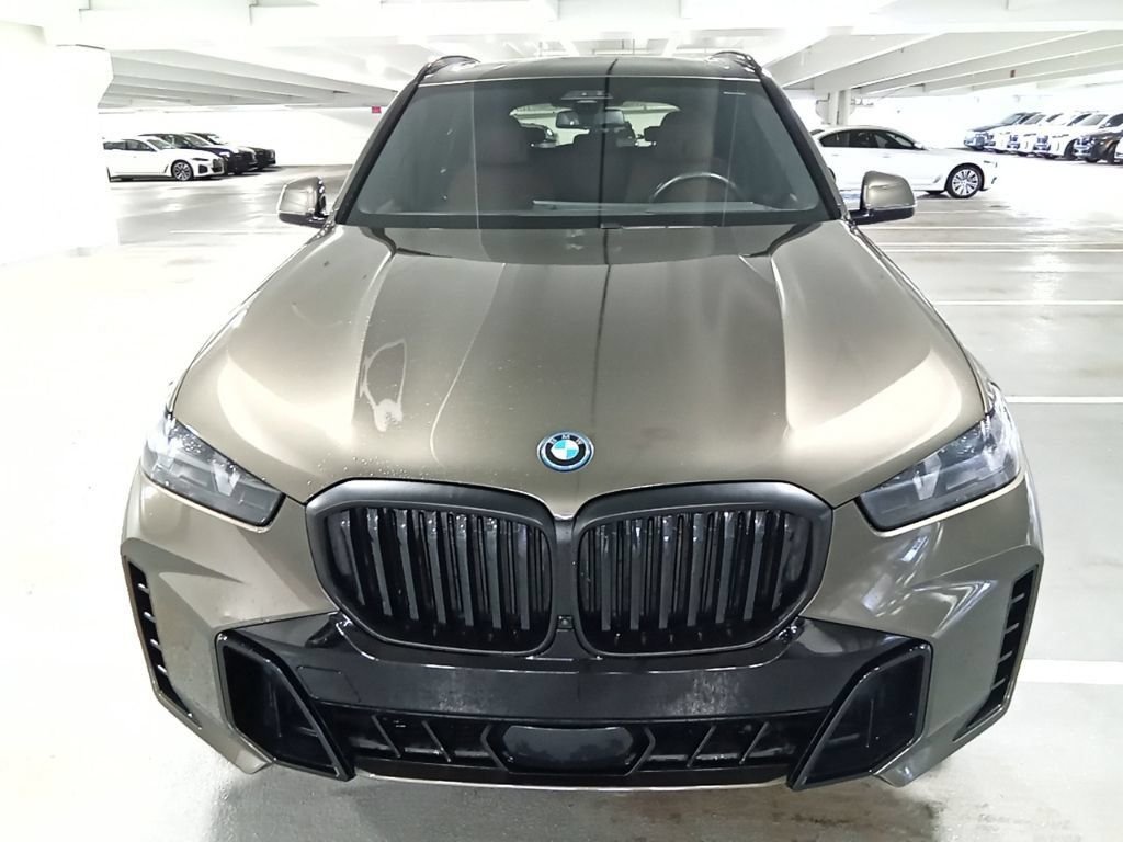 Used 2024 Manhattan Green Metallic BMW xDrive50e image 2