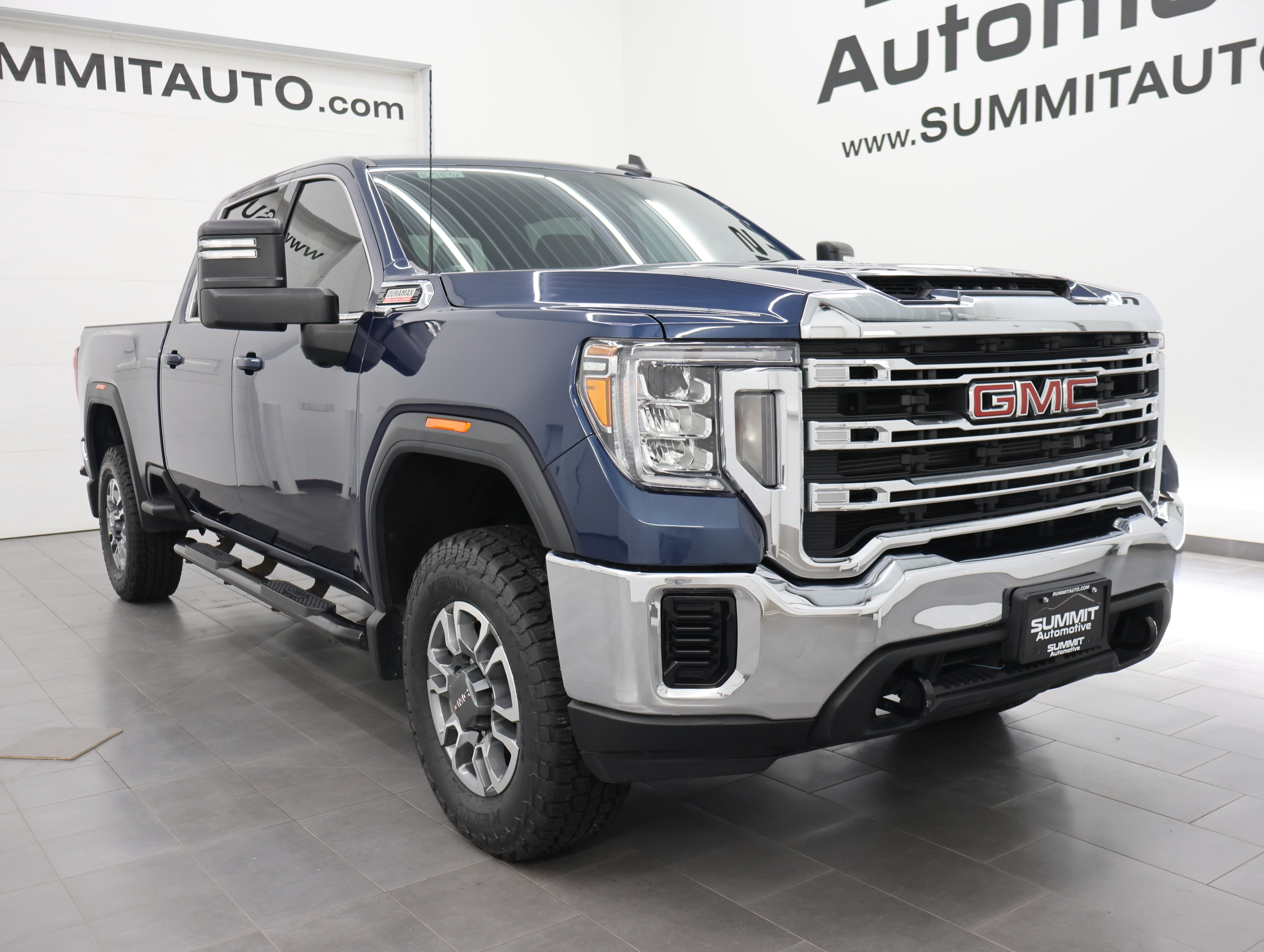Used 2023 Pacific Blue Metallic GMC 4x4 Crew Cab SLE: CREW-SHORT-SLE-6.6L DIESEL-4WD-NEW TIRES-BACKUP CAM image 2