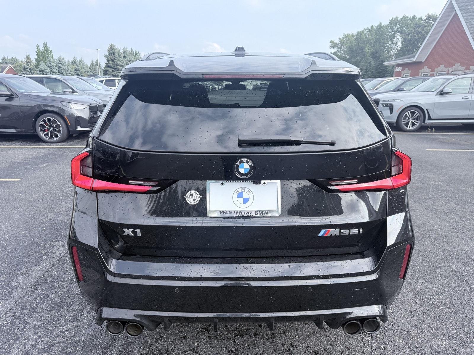 Used 2025 Black Sapphire Metallic BMW M35i image 6