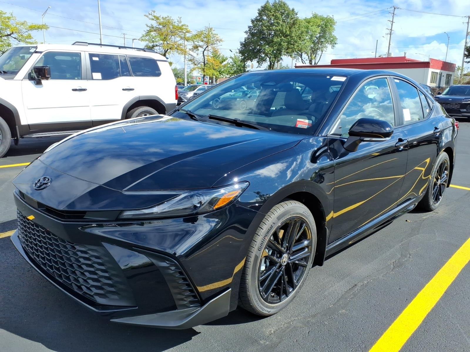 New 2026 Midnight Black Metallic Toyota  SE AWD image 3