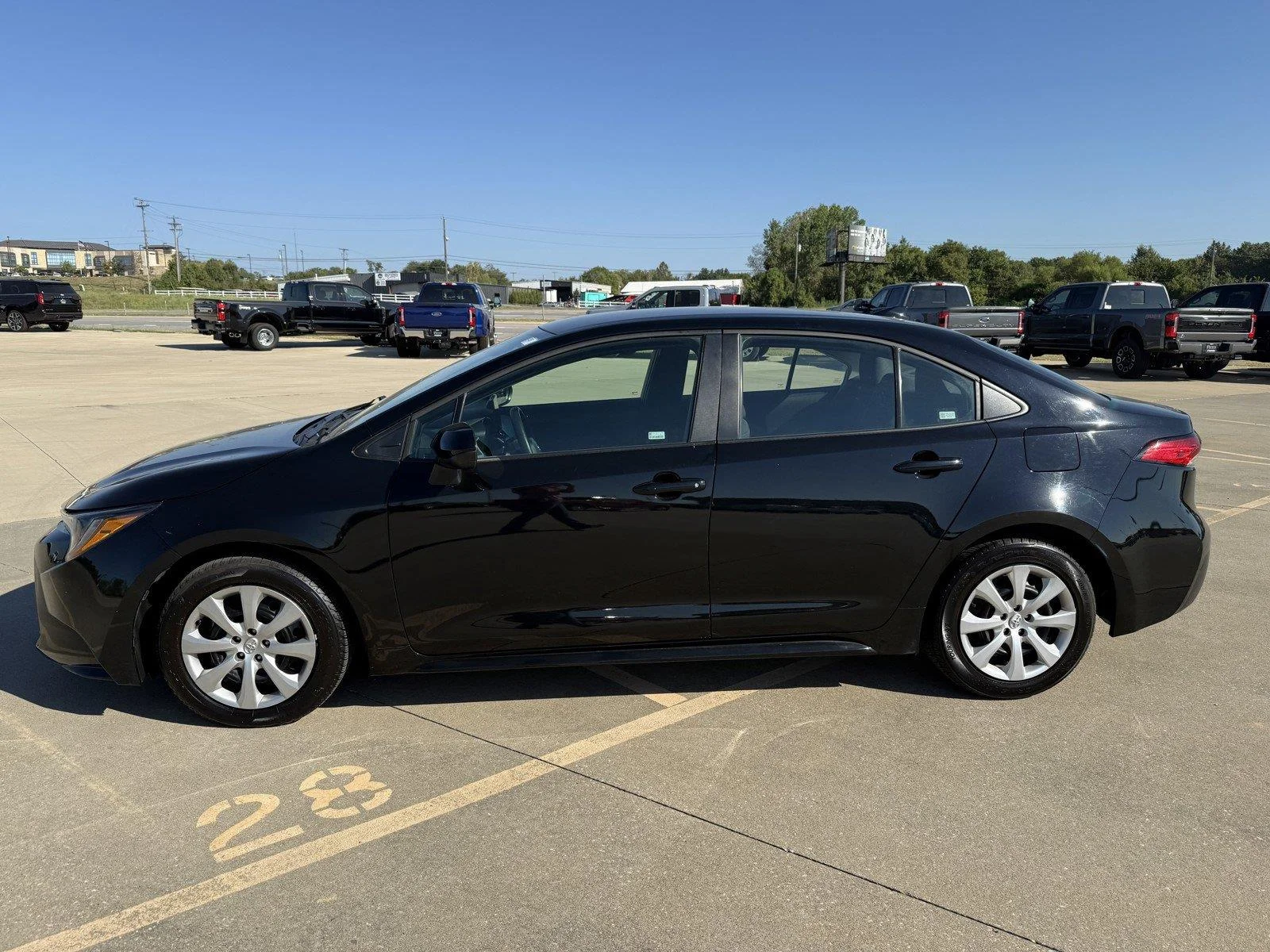 Certified Used 2025 Midnight Black Metallic Toyota LE image 5