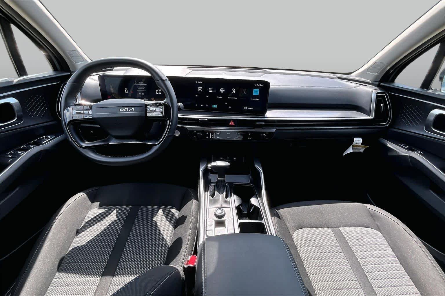 New 2026 Ivory Silver Kia LX image 13