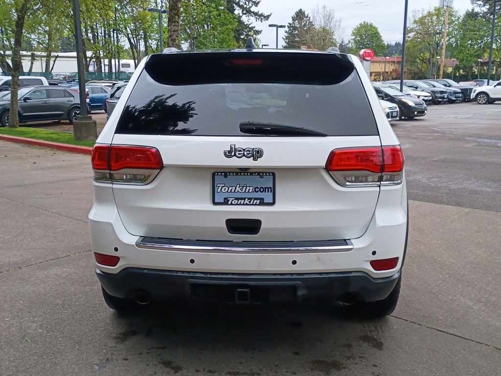 Used 2014 Black Forest Green Pearlcoat Jeep Limited image 4