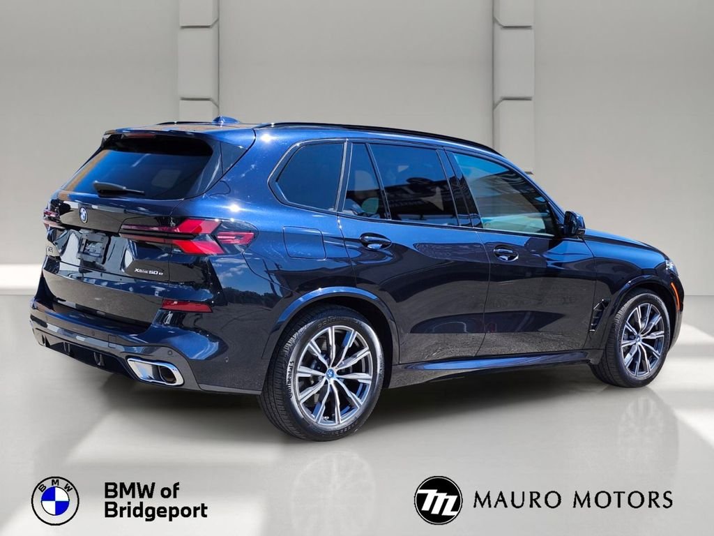 Used 2025 Black BMW xDrive50e image 6
