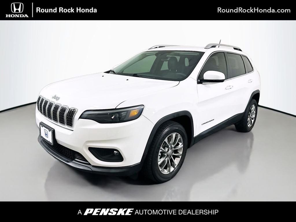 Used 2021 Bright White Clearcoat Jeep Latitude Lux image 1