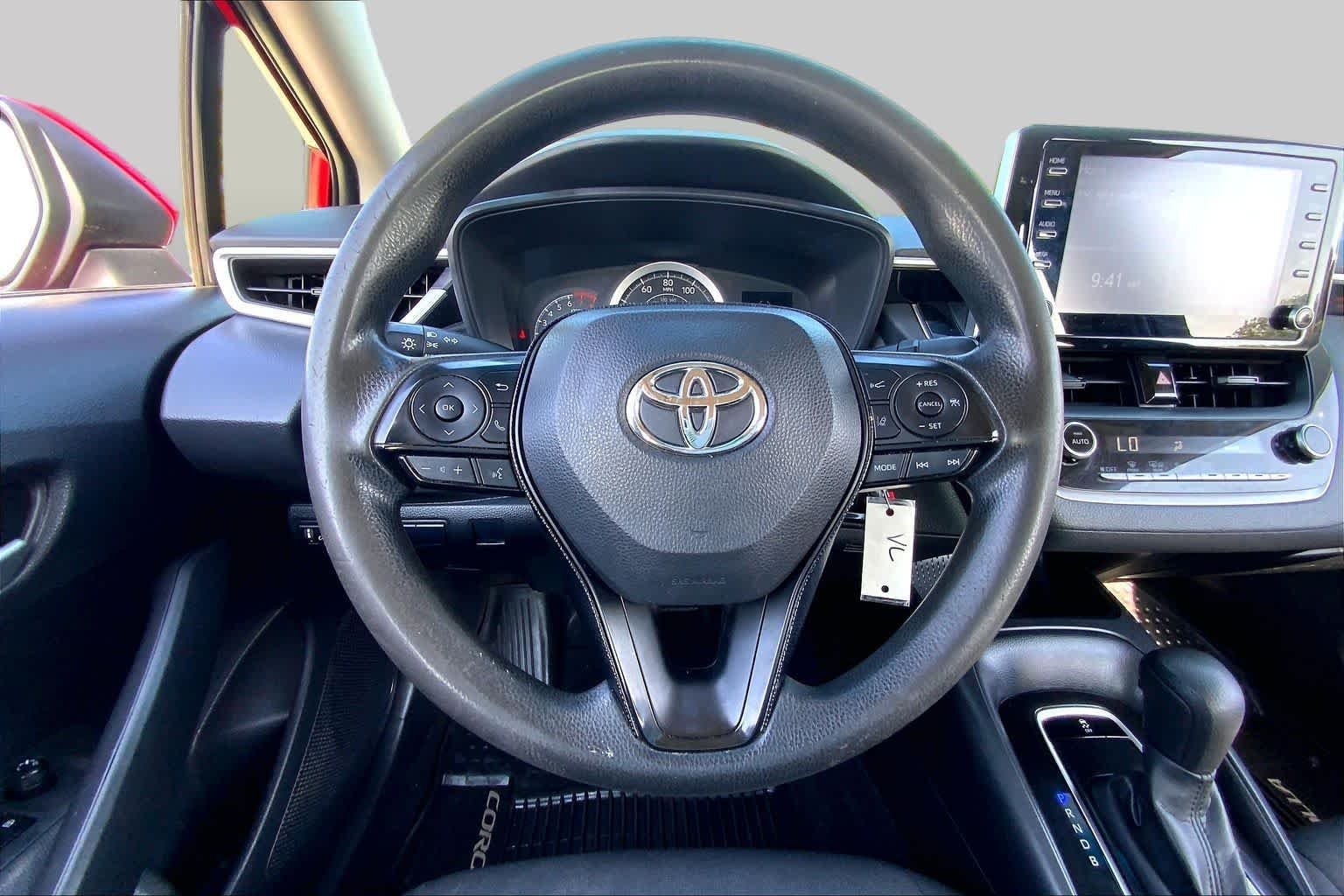 Used 2020 Barcelona Red Metallic Toyota LE image 6