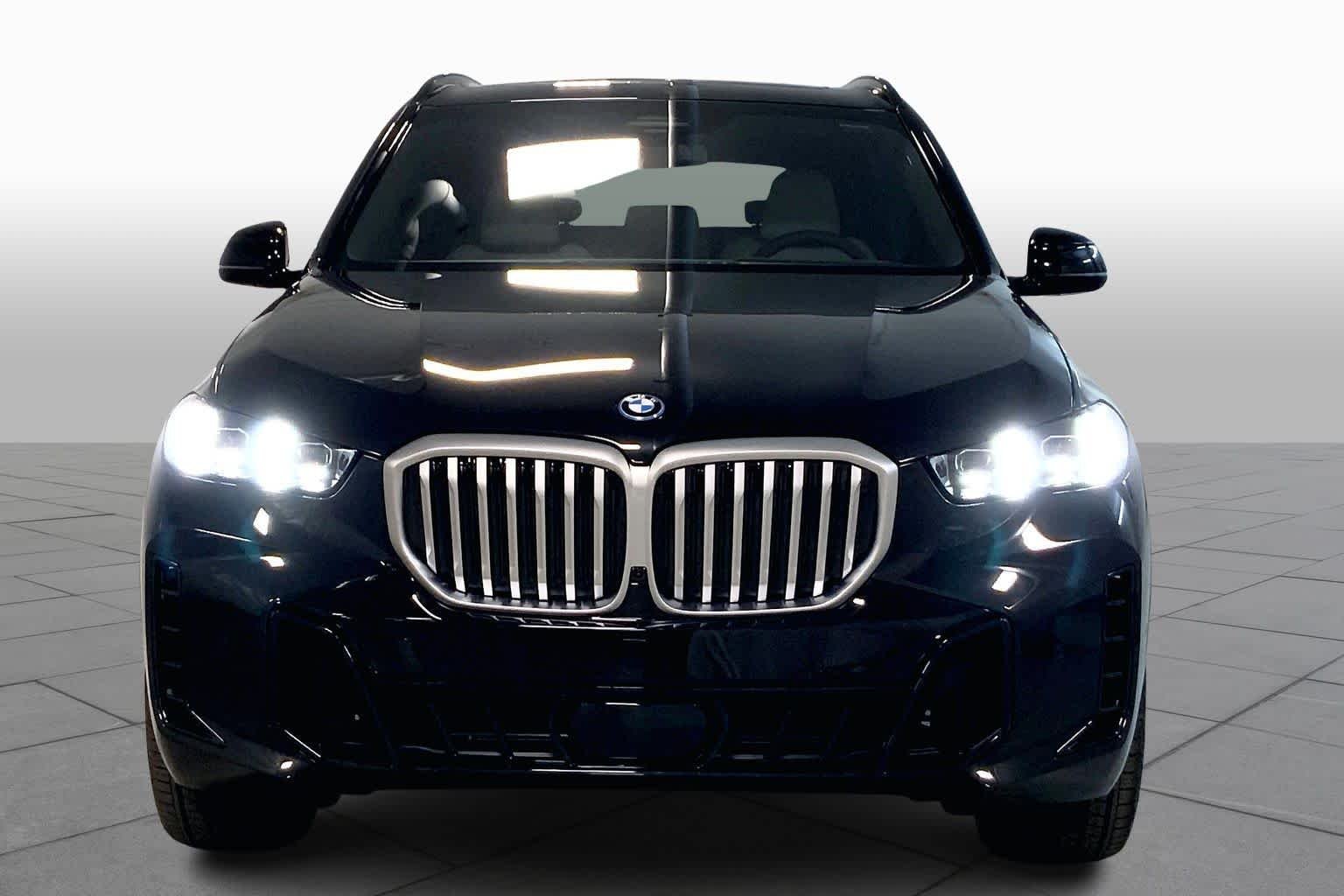 New 2026 Black Sapphire Metallic BMW xDrive50e image 3