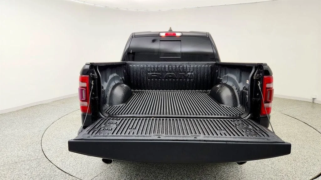 Used 2023 Diamond Black Crystal Pearlcoat Ram Laramie 4x4 Crew Cab 5