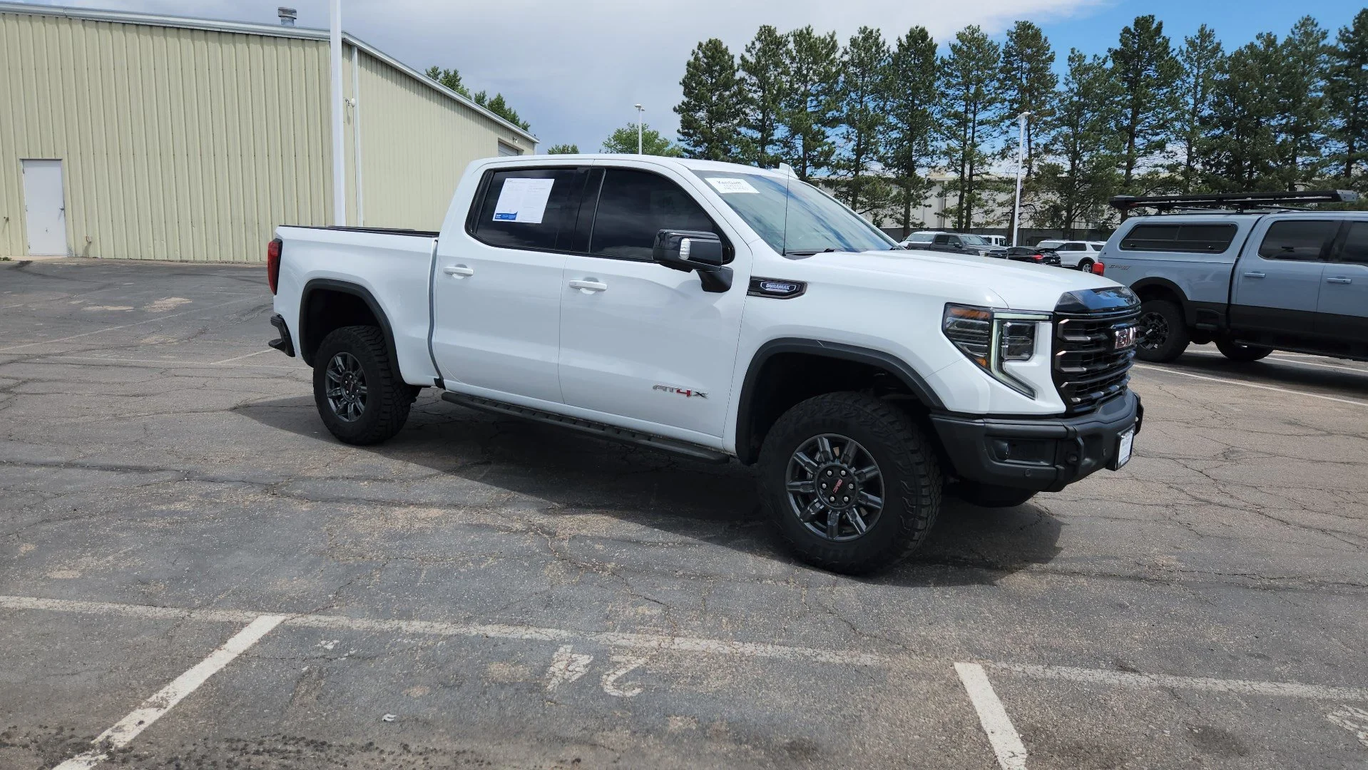 Used 2025 Summit White GMC AT4X image 13