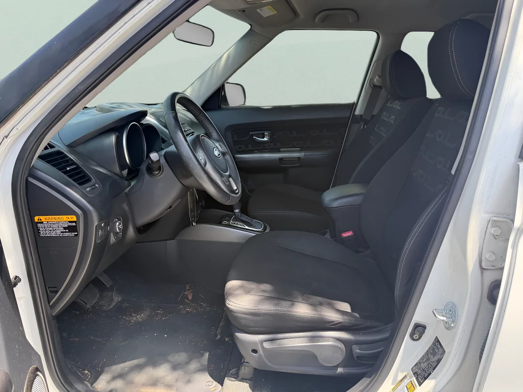 Used 2012 Clear White Kia Plus image 6
