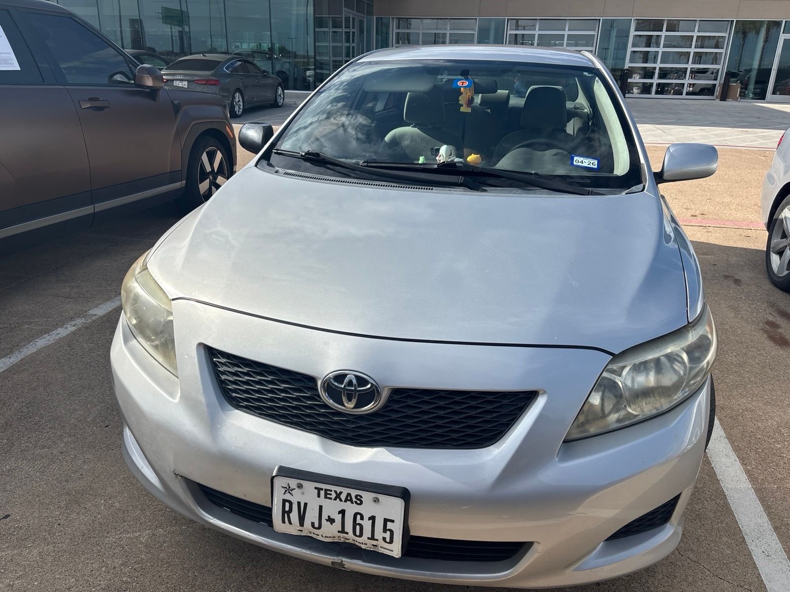 Used 2010 Classic Silver Metallic Toyota LE image 2