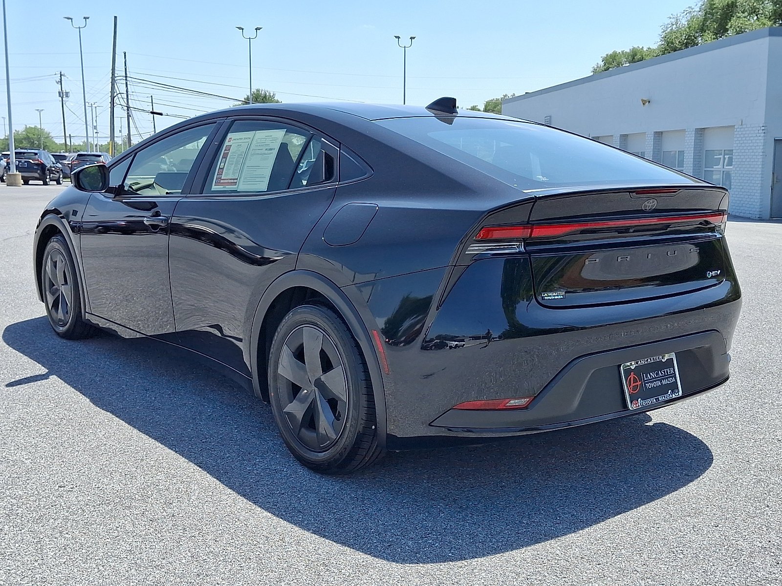 Used 2025 Midnight Black Metallic Toyota LE image 5