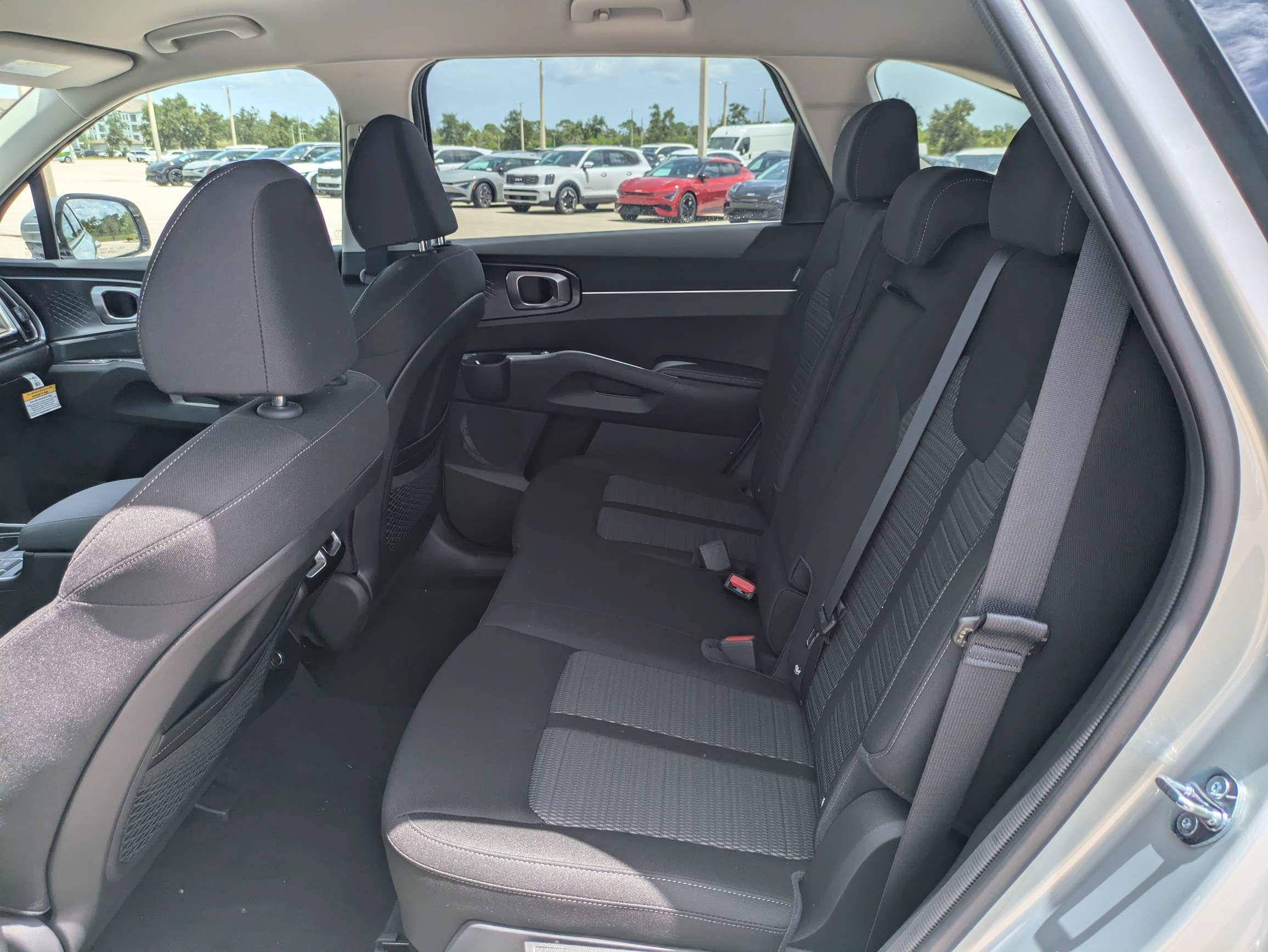 New 2026 Ivory Silver Kia LX image 16