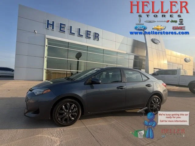 Used 2018 Slate Metallic Toyota LE image 1