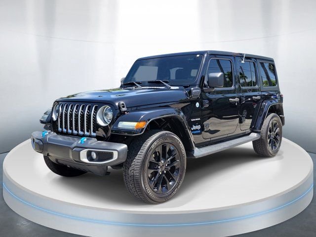 Used 2022 Black Jeep Unlimited Sahara 4xe image 2