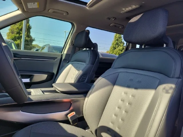 New 2026 Ivory Silver Kia Wind AWD image 14