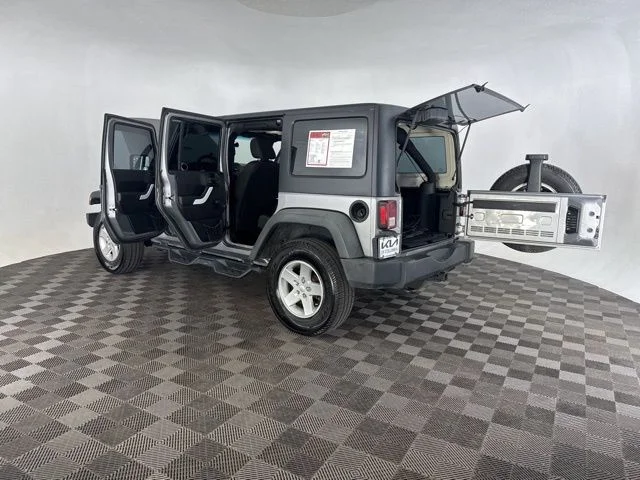 Used 2014 Silver Jeep Unlimited Sport image 18
