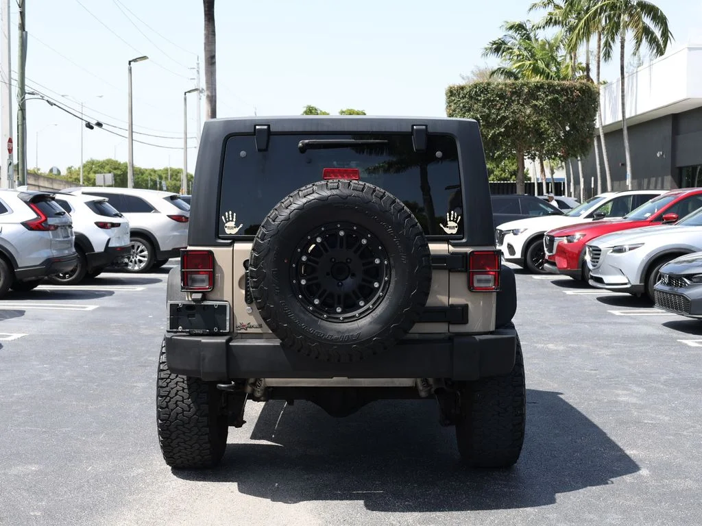 Used 2016 Beige Jeep Unlimited Sport image 6