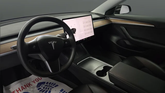 Used 2023 Solid Black Tesla Base image 12