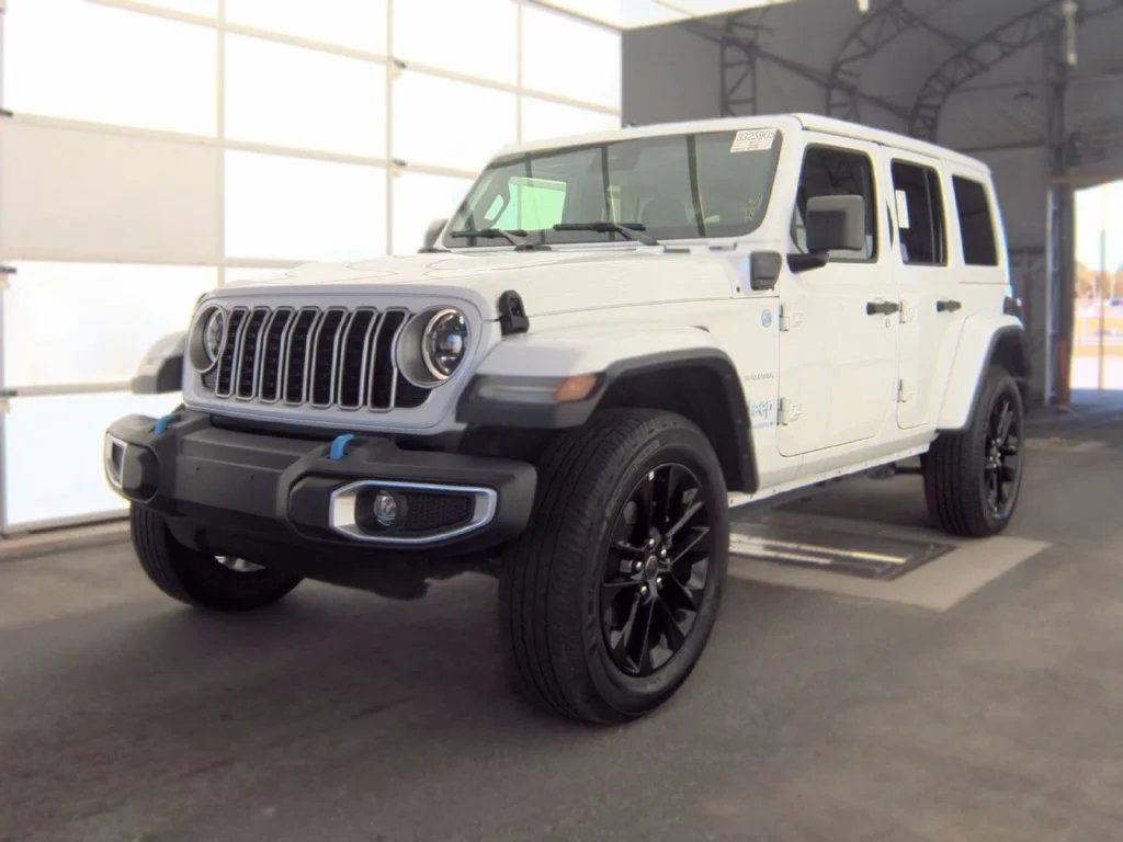 Used 2024 White Jeep Sahara 4xe image 1