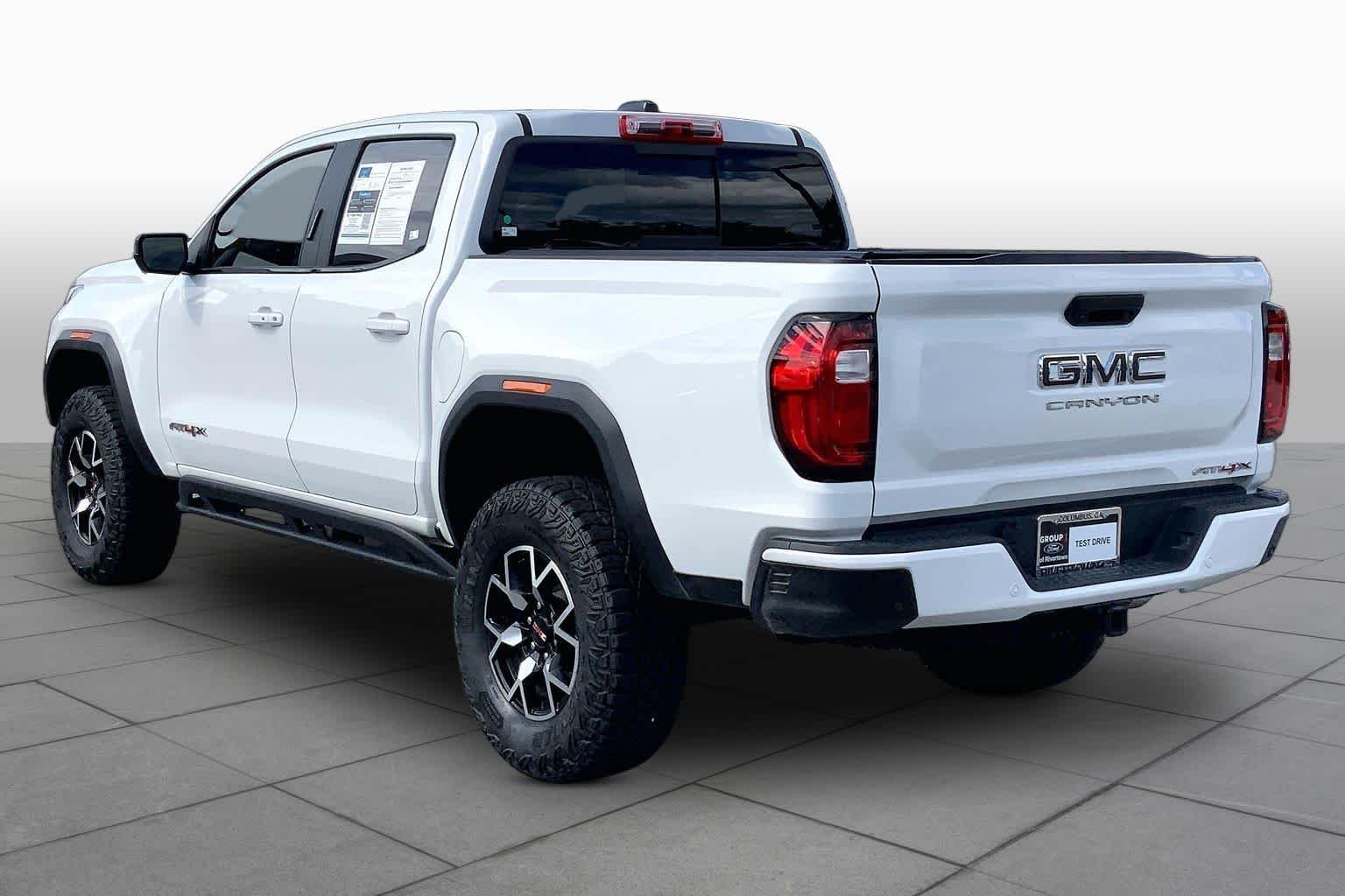 Used 2024 Summit White GMC 4WD AT4X image 11