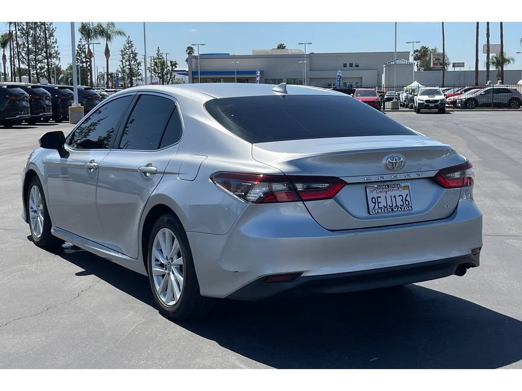 Used 2023 Celestial Silver Metallic Toyota LE image 4