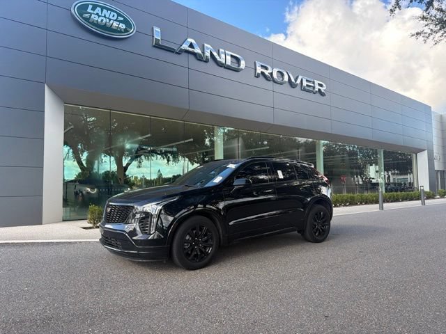 Used 2020 Stellar Black Metallic Cadillac FWD Premium Luxury image 1