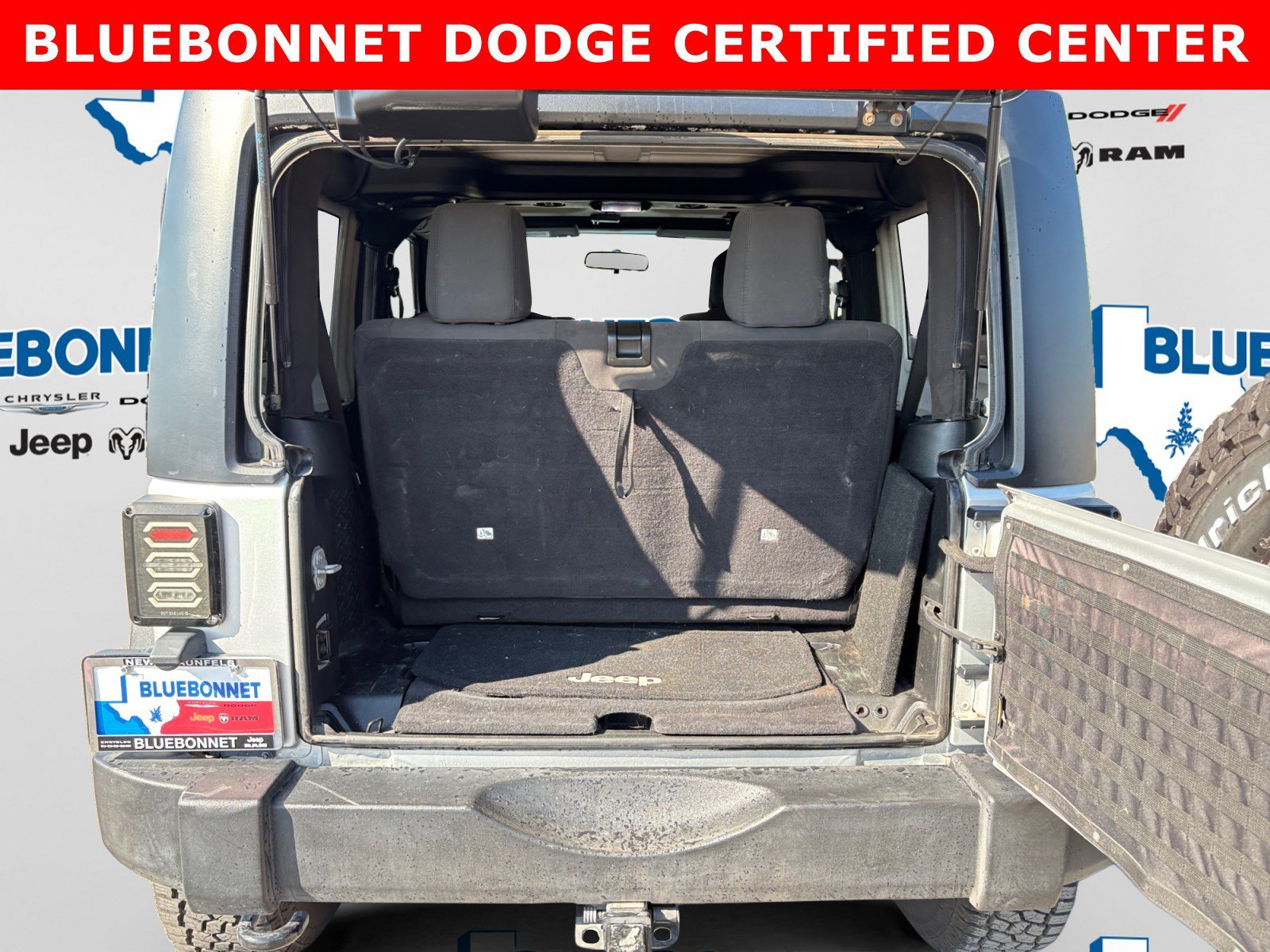 Used 2012 Bright Silver Metallic Jeep Sport image 22