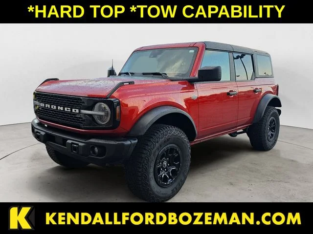 Used 2023 Hot Pepper Red Metallic Tinted Clearcoat Ford Wildtrak image 1