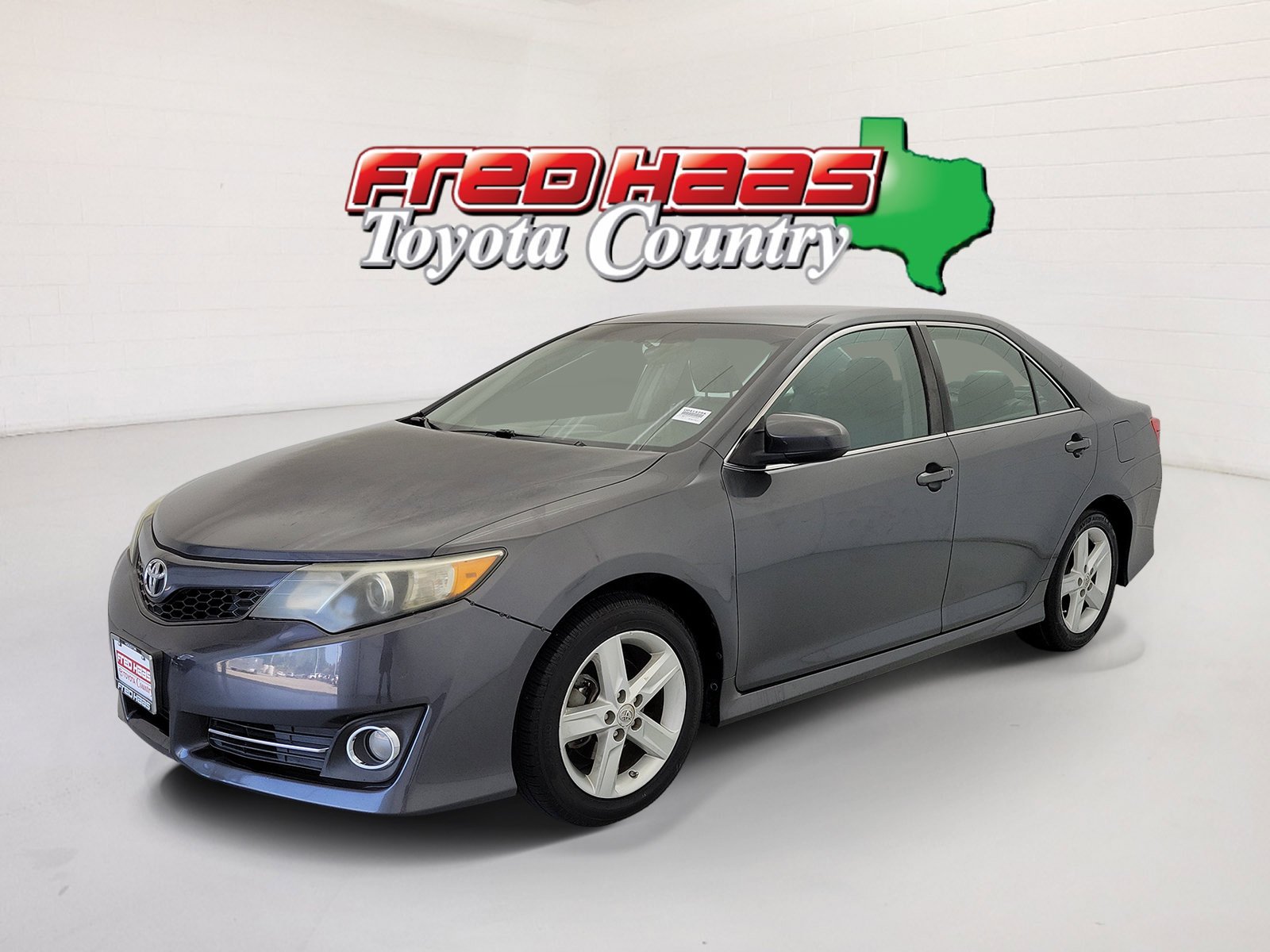 Used 2012 Magnetic Gray Metallic Toyota SE image 1