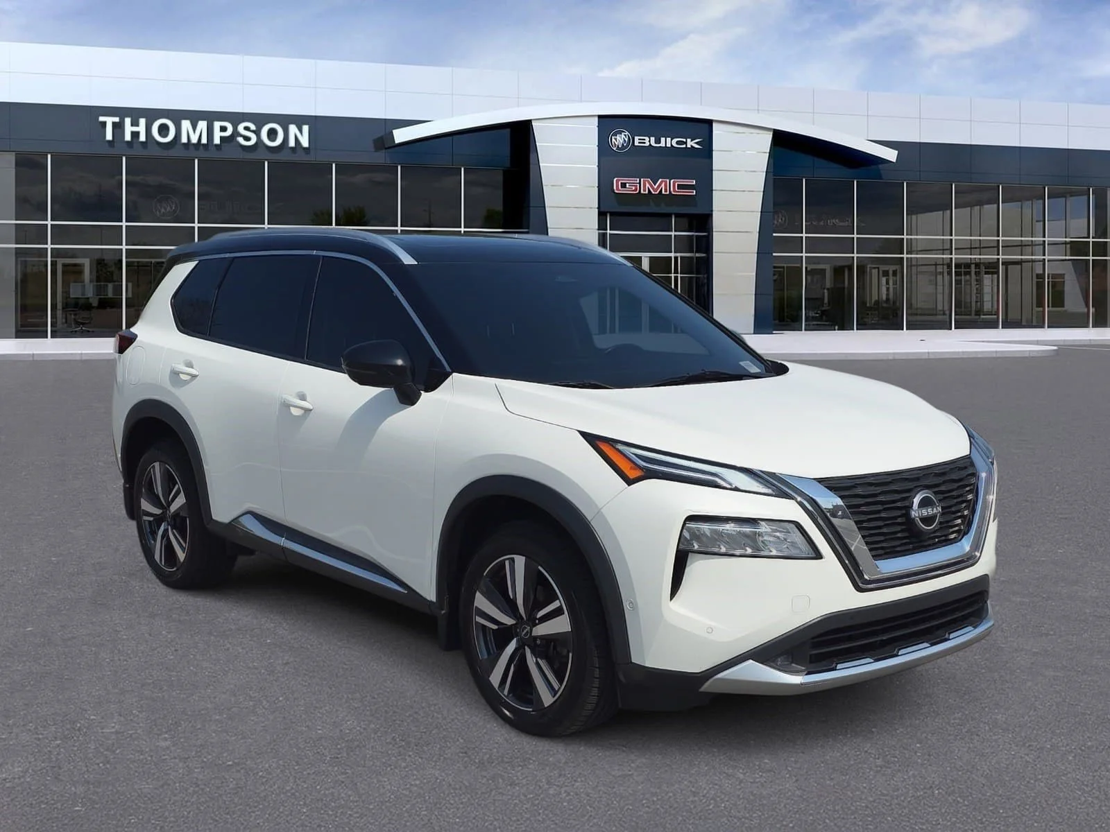 Used 2022 Pearl White Tricoat/super Black Nissan Platinum image 1