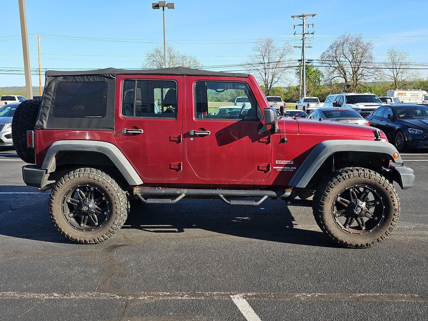 Used 2011 Deep Cherry Red Crystal Pearl Coat Jeep Sport image 4
