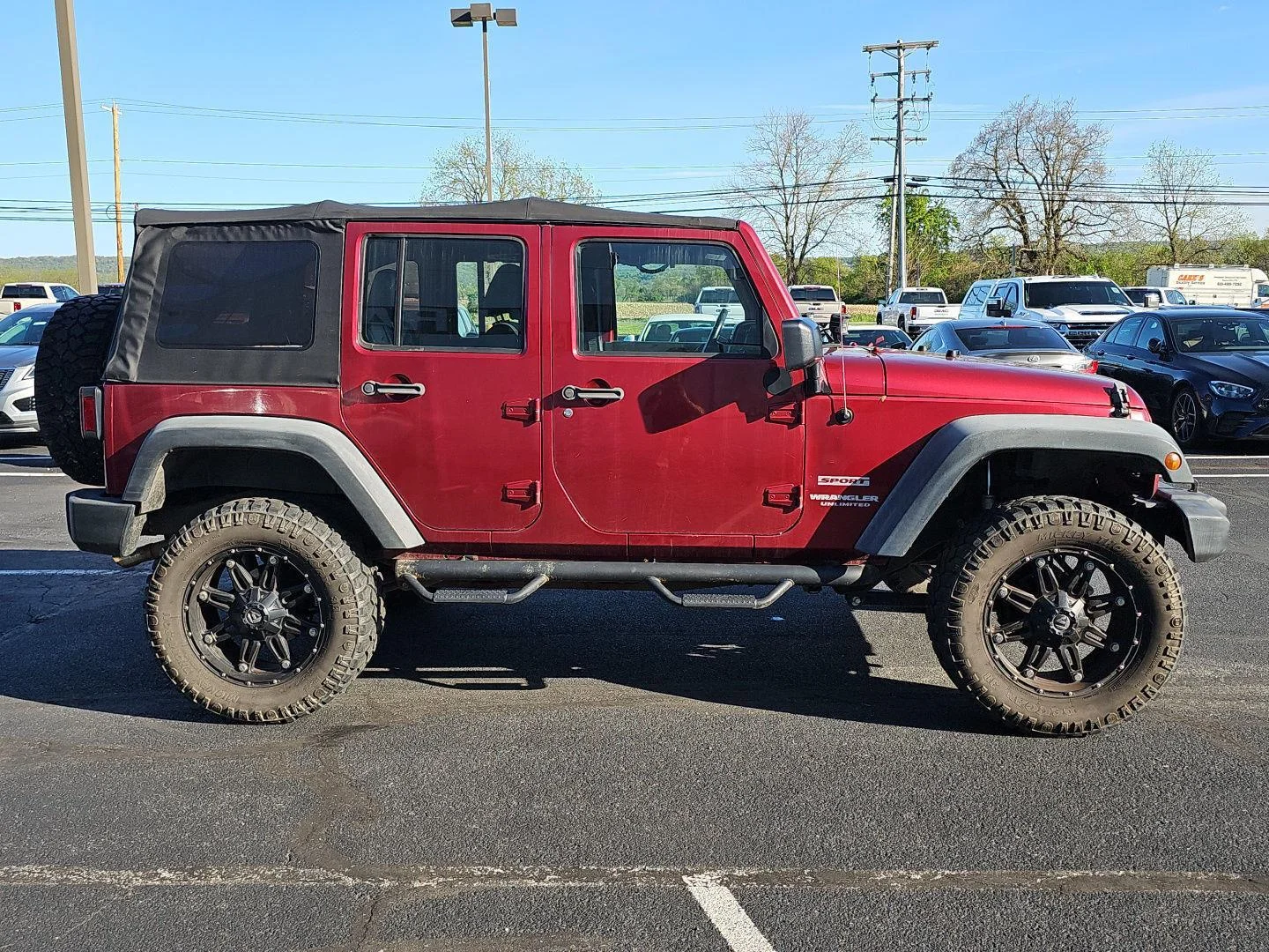Used 2011 Deep Cherry Red Crystal Pearlcoat Jeep Sport image 4